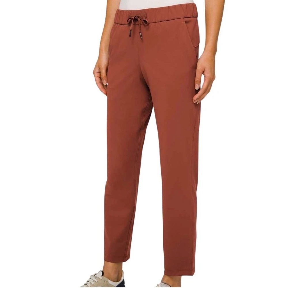 Lululemon Women On the Fly 7/8 Pant Mid Rise 27" Inseam rustic clay size 6